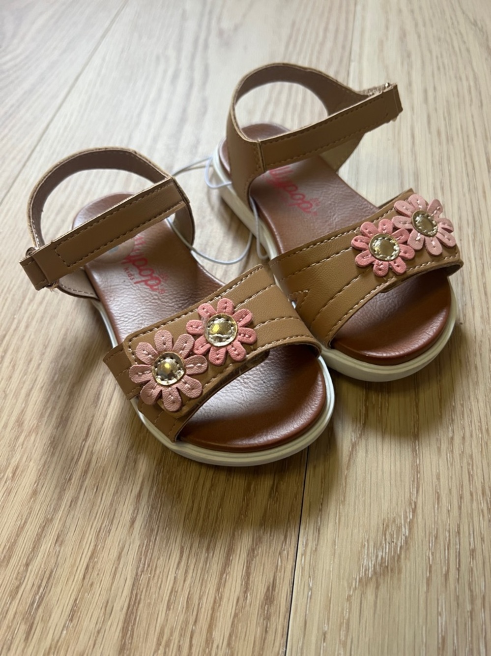 Jellypop kids Tan Sandals with Pink Flower Accent